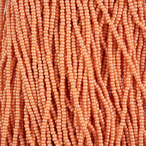 Czech Seed Beads 10/0 PermaLux Dyed Chalk Apricot Strung image