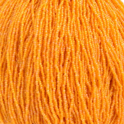 Czech Seed Bead 11/0 Transparent Light Orange Matt AB Strung image