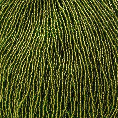 Czech Seed Bead 11/0 Transparent Green Copperlined Strung image