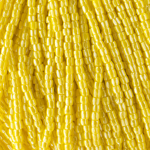 Czech Seed Beads 9/0 3Cut Opaque Yellow Luster Strung image